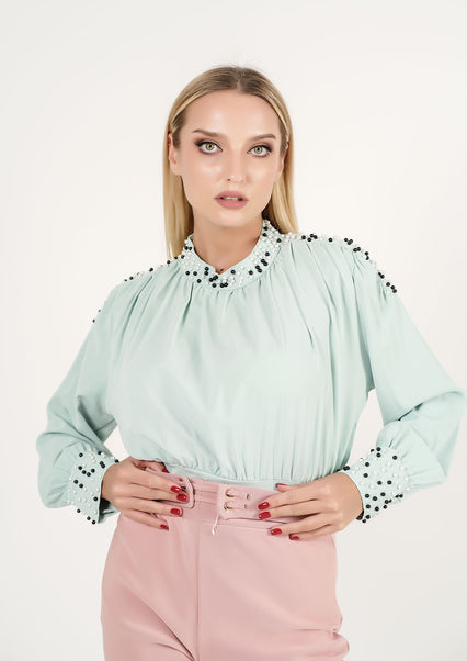 Chic Mint Breeze: The Sparkle-Adorned Top That Speaks Style